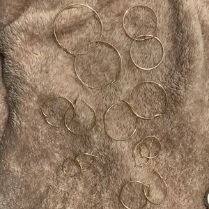 7 PAIRS OF ROSE GOLD HOOPS NWOT